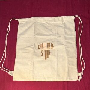 Charlotte Stone Cream Drawstring Bag with Gold Logo